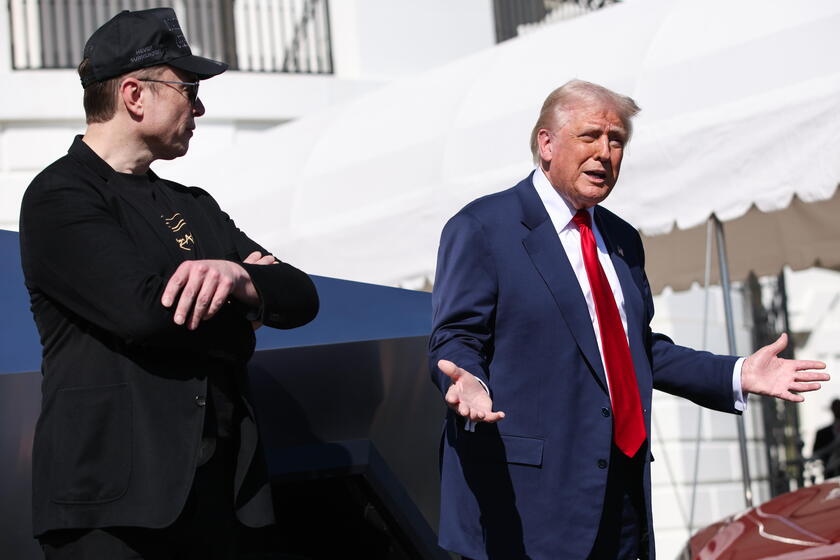 US President Trump views Tesla vehilces in front of the White House