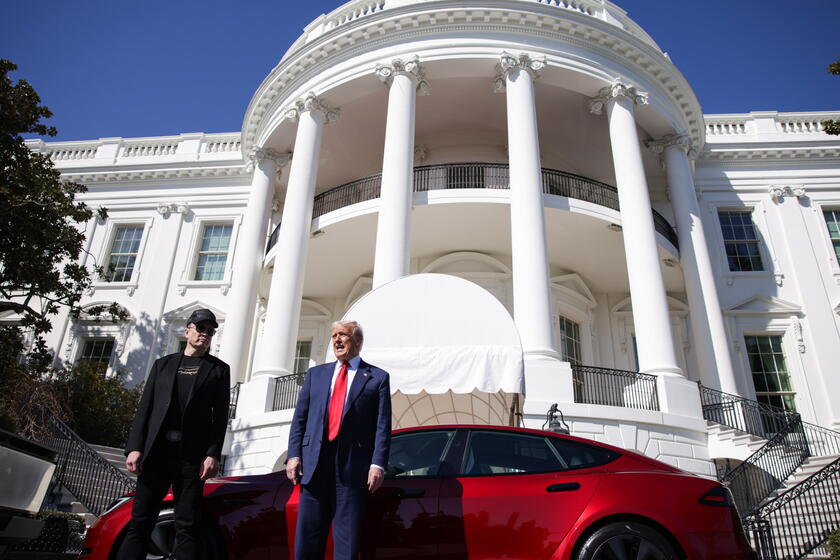 US President Trump views Tesla vehilces in front of the White House