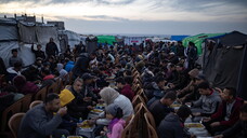 Palestinians in Khan Younis gather to break fast on Ramadan's fourth day